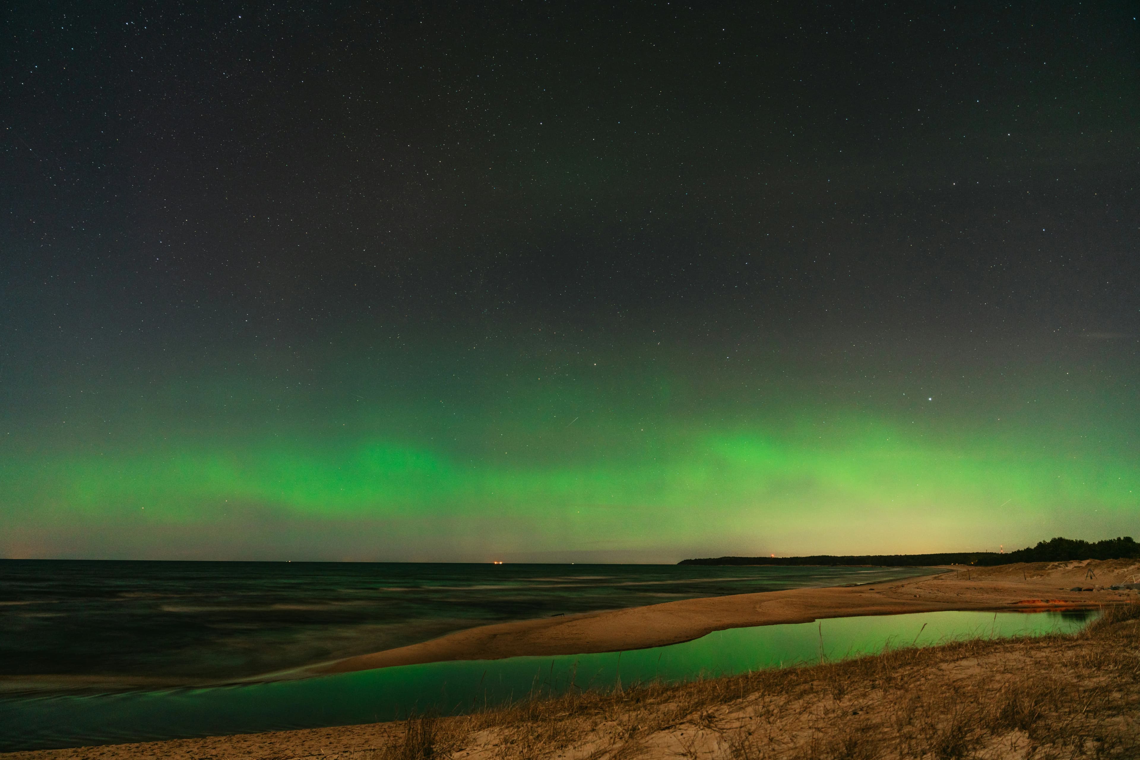 Colourful aurora with green, purple and red bands