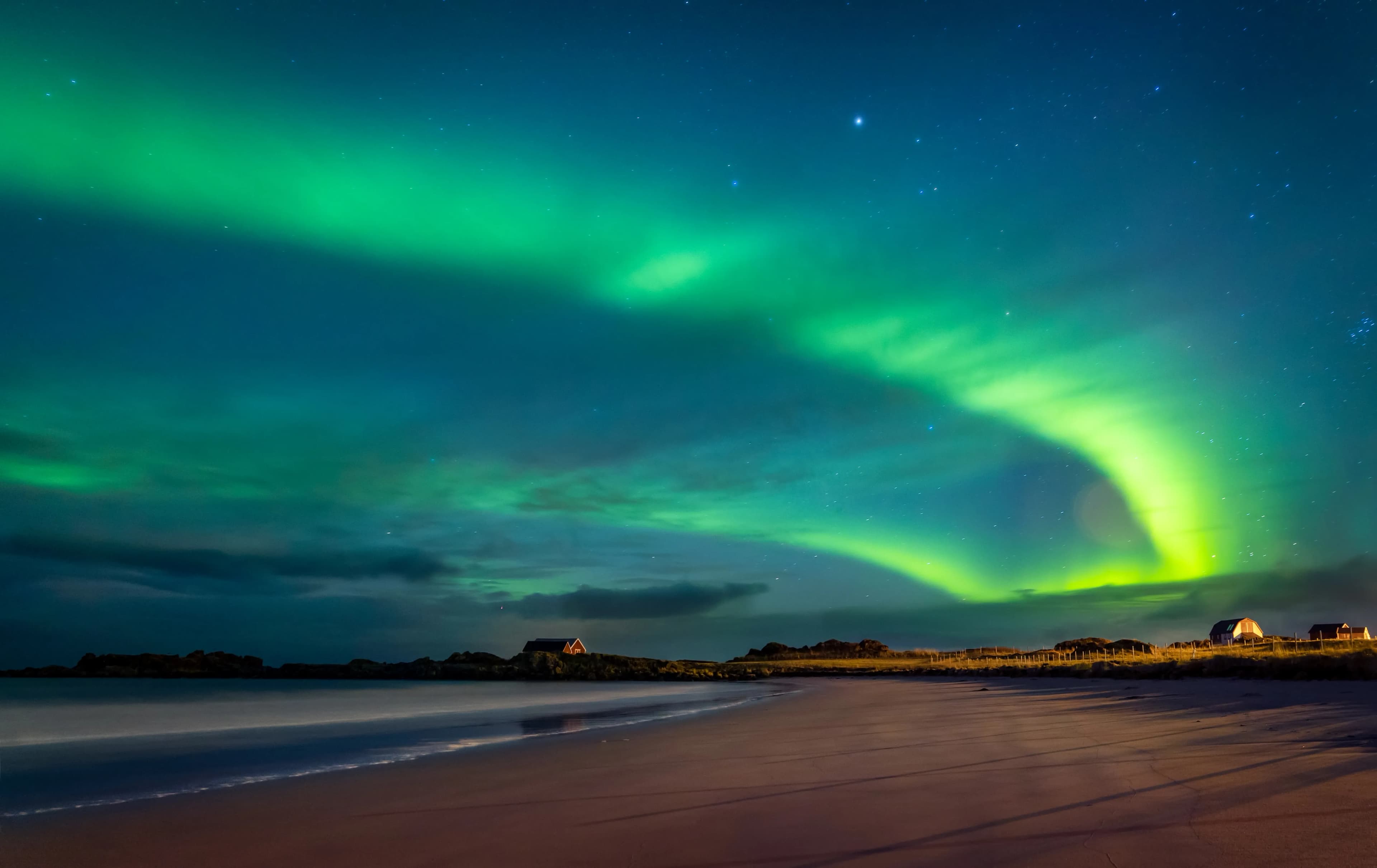 Northern lights over a Norwegian winter landscape