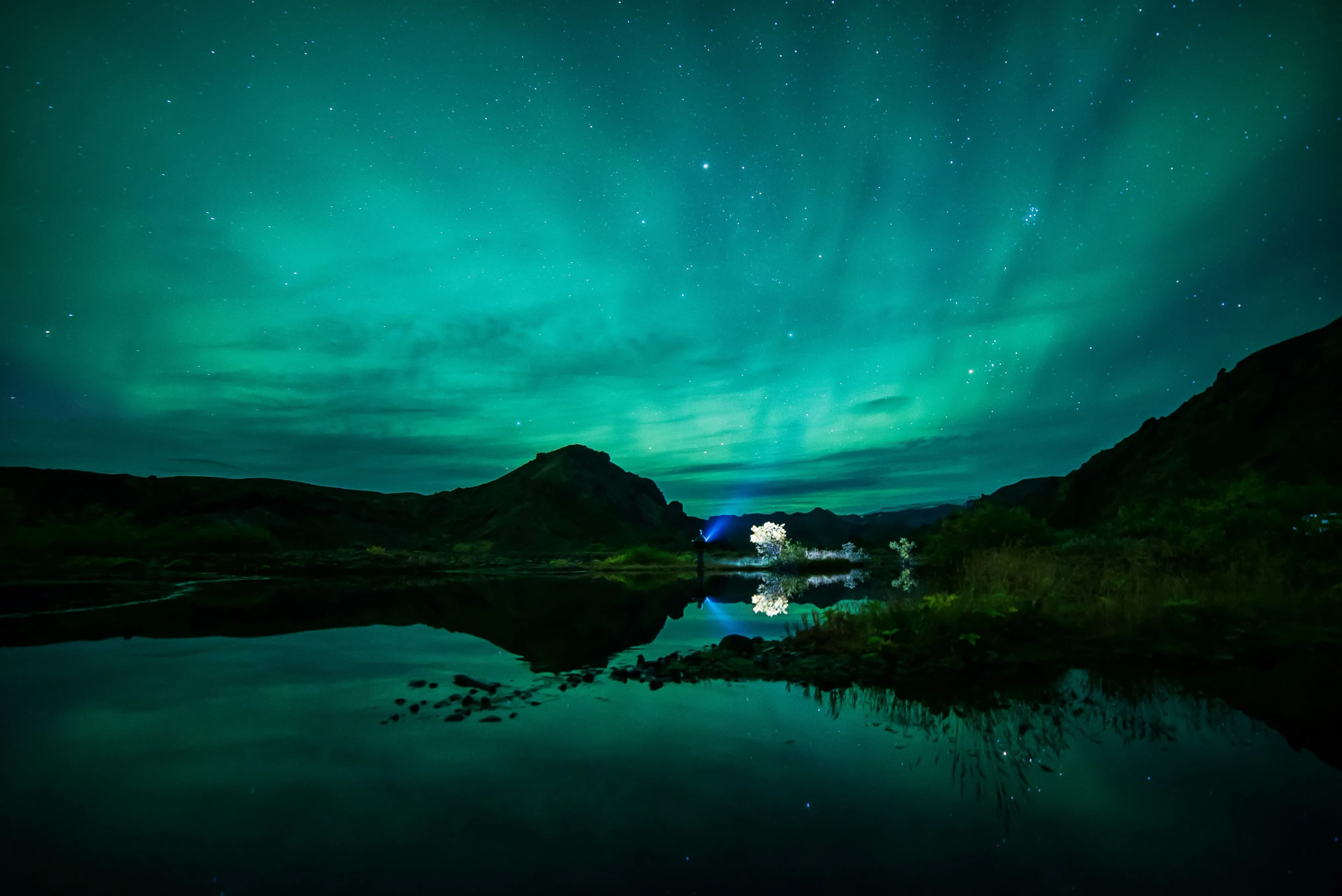Northern lights viewed from above Tromsø fjord